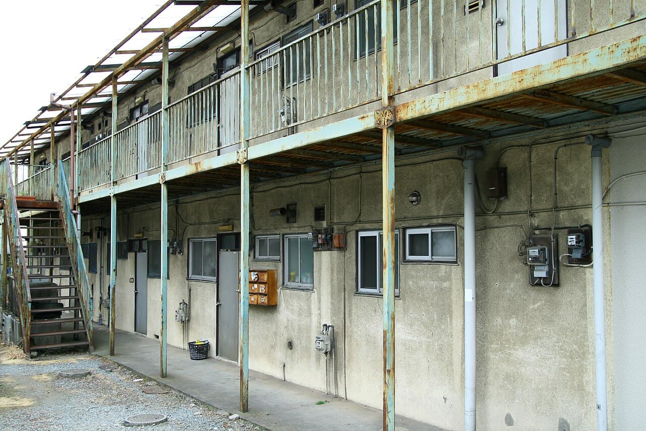 A two-storey Japanese rental apartment building — illustrative of the ordinary small 'apaato' building whose move-in cost sheet this guide explains, not a specific listing