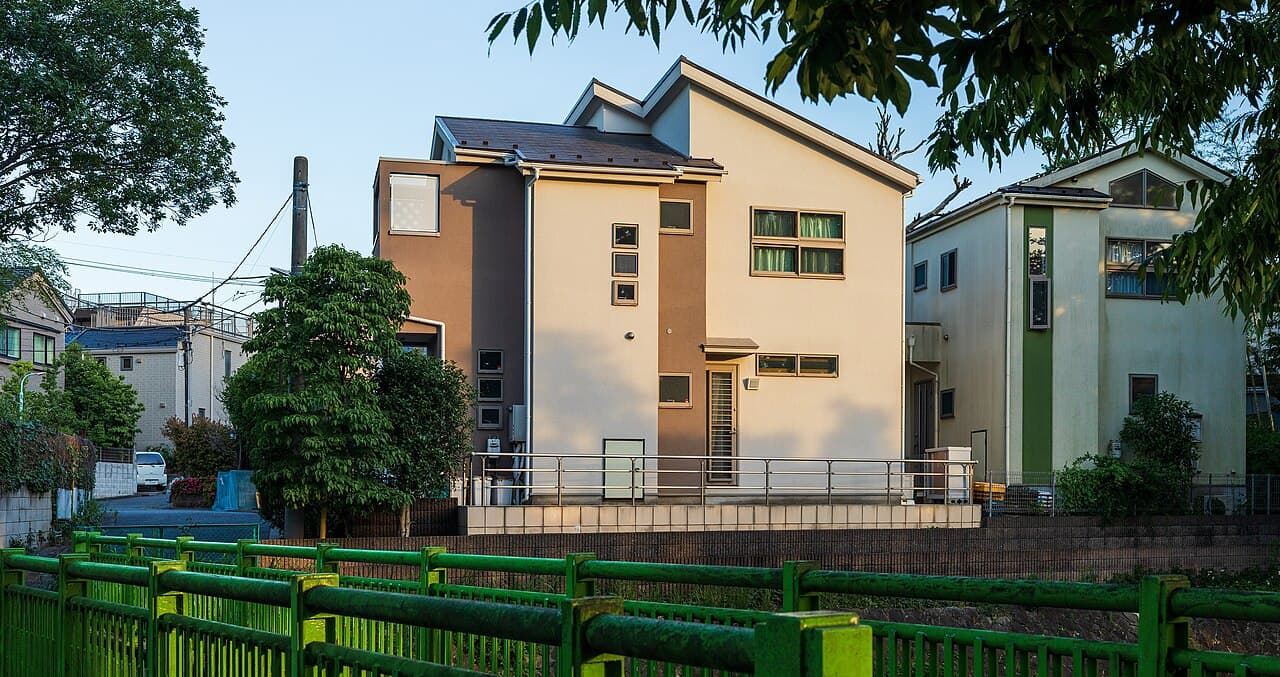 A quiet residential street of low-rise houses in Suginami, Tokyo — illustrative of the ordinary homes now subject to Japan's non-resident real estate reporting rule, not a specific property discussed in the article